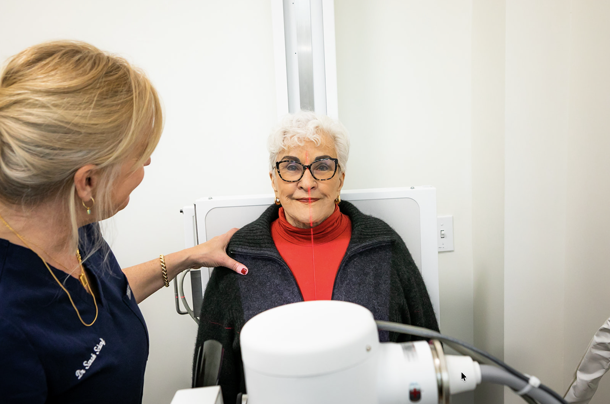 Dr. Sarah Scharf caring for a patient at Marin Joint Health
